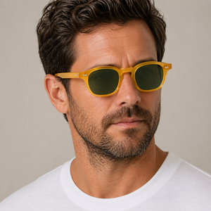 Close-up of male model wearing Cord Eco Honey square sunglasses with bottle green lenses, unisex bio acetate frame made in Italy.