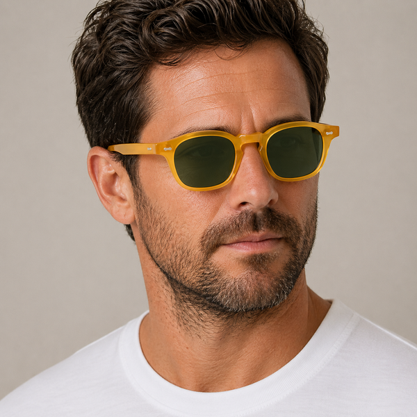 Close-up of male model wearing Cord Eco Honey square sunglasses with bottle green lenses, unisex bio acetate frame made in Italy.