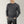 Charcoal merino wool jumper made from 100% premium merino wool for a soft, luxurious feel. Designed with a classic crew neck and ribbed detailing,