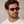 Ellipse Eco Black Grey oval sunglasses with dark lenses worn on male model, bio acetate frame made in Italy.