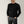 Black merino wool jumper made from 100% premium merino wool for a soft, luxurious feel. Designed with a classic crew neck and ribbed detailing,
